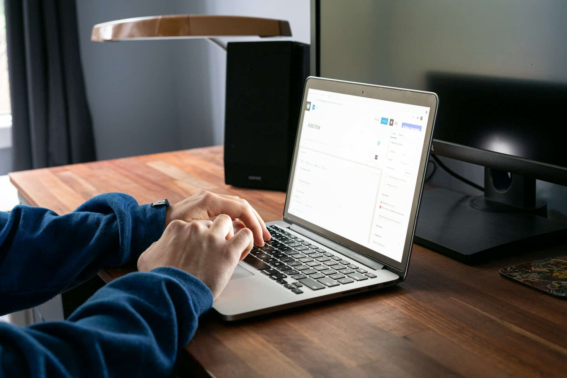 Person setting up a WordPress blog using the WordPress dashboard in 2026